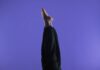 바쁜 일상 속 ‘필라테스’, 내 몸을 위한 작은 변화 a person doing a handstand on a purple background