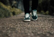 직장인을 위한 건강 관리, 일상에서 쉽게 실천하는 최신 트렌드 a person standing on a gravel road with their shoes on