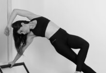 홈트족의 반란: 유튜브 보고 따라 하던 필라테스, 왜 내 허리는 더 아플까? woman in black sports bra and black leggings doing yoga